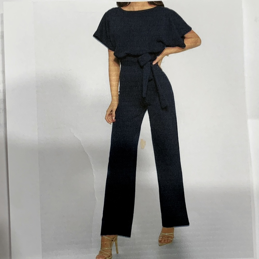 Button Lace-up Short-sleeved Jumpsuit
Color: Navy
Size: L